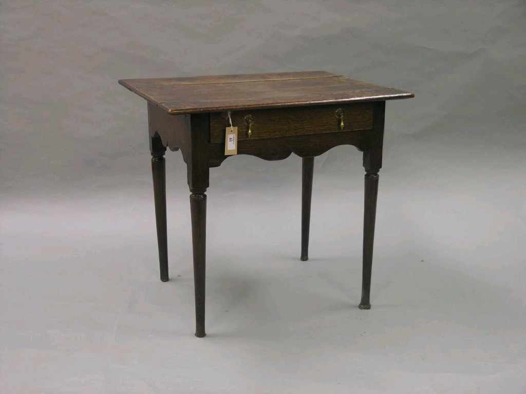 Appraisal: A th century oak side table overhanging top above single