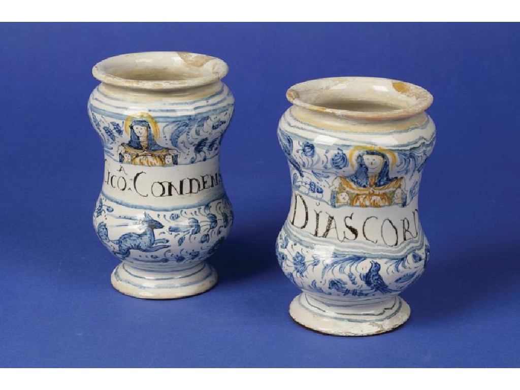 Appraisal: A PAIR OF DELFTWARE BLUE AND WHITE ALBARELLI each painted