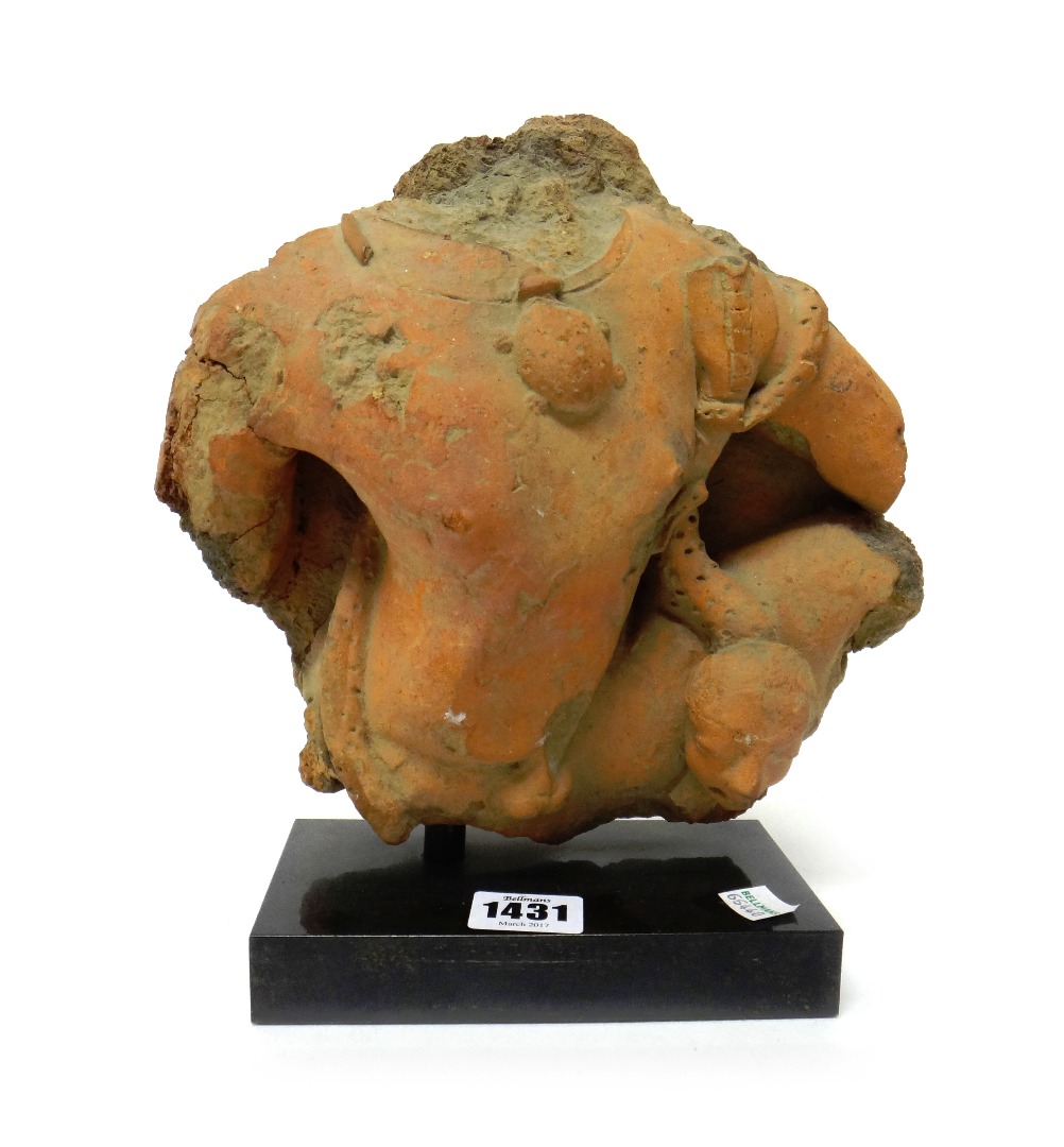 Appraisal: A sandstone torso fragment possibly Indian th century or later