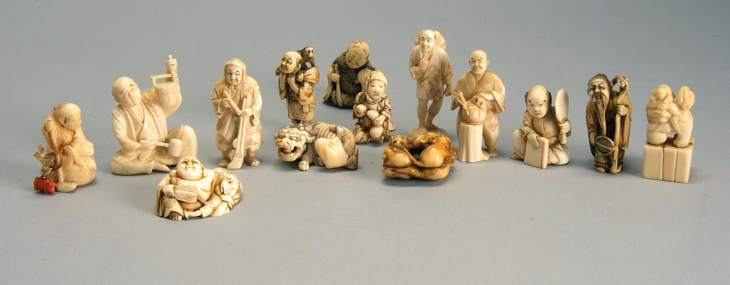 Appraisal: COLLECTION OF FOURTEEN IVORY AND BONE NETSUKE OKIMONO Shishi with