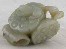 Appraisal: A Chinese jade pendant carving of a frog on a