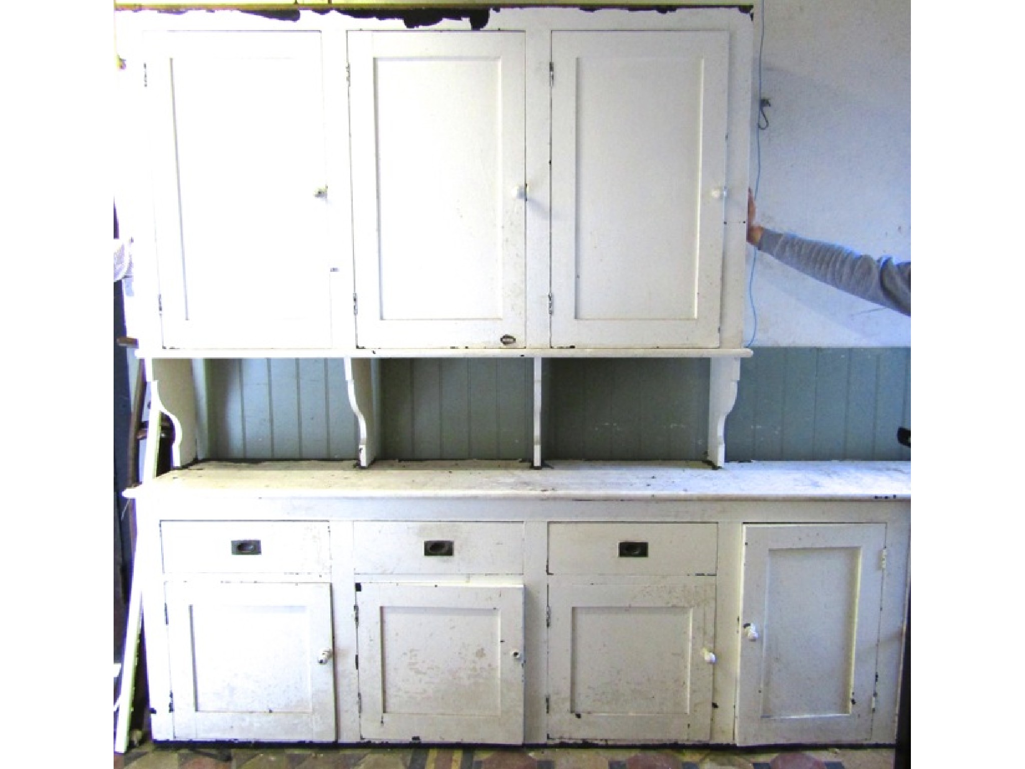 Appraisal: A large vintage painted pine kitchen dresser the long and