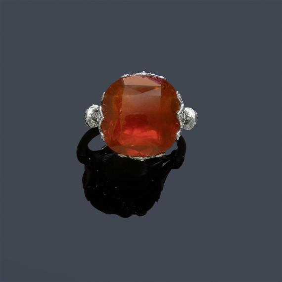 Appraisal: A FIRE OPAL AND DIAMOND RING circa Platinum Very decorative