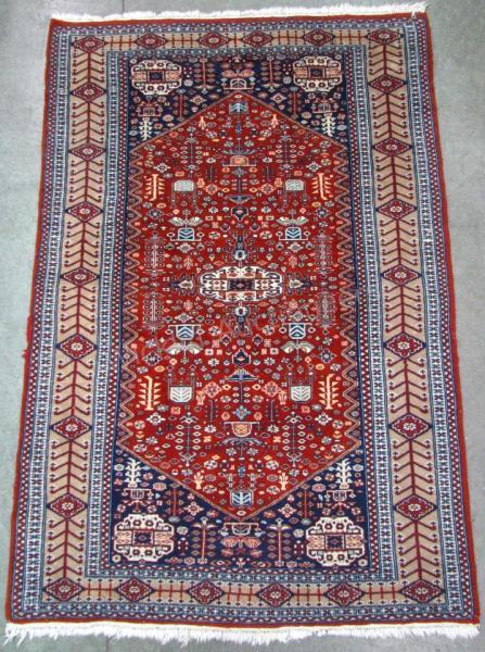 Appraisal: A handmade Oriental rug Hamadan red field ' x '