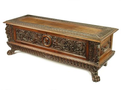 Appraisal: A late th century Italian walnut cassone with carved decoration