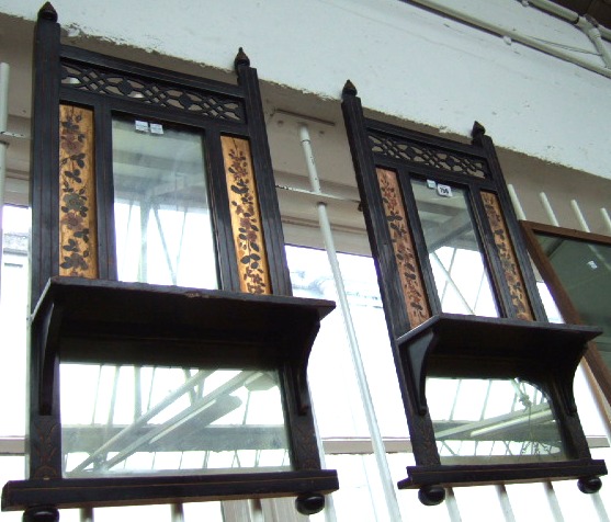 Appraisal: A pair of Victorian ebonised and parcel gilt aesthetic movement