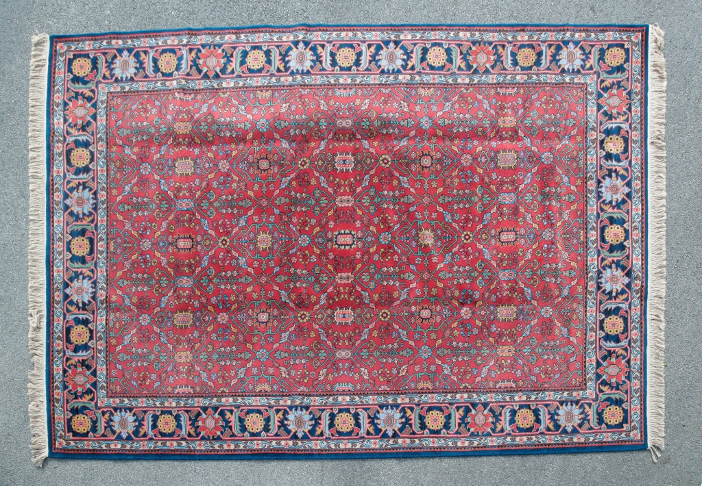 Appraisal: Second half th century wool Salmon-color field with blue border