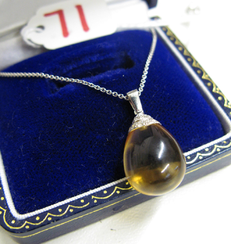 Appraisal: CITRINE DIAMOND AND EIGHTEEN KARAT WHITE GOLD PENDANT NECKLACE The