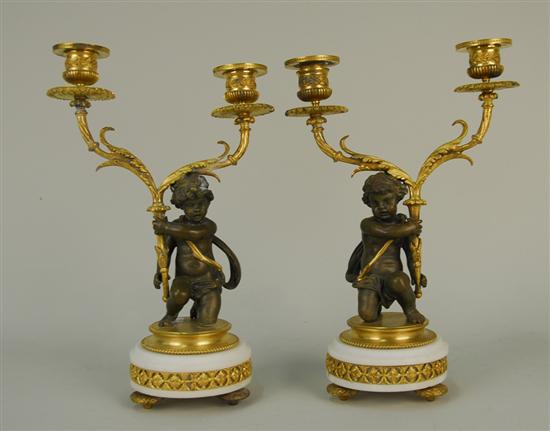 Appraisal: PAIR OF FRENCH GILT AND PATINATED BRONZE TWO LIGHT FIGURAL