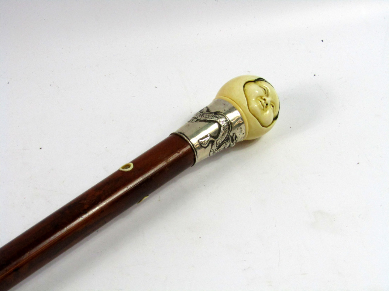 Appraisal: A malacca walking stick late thC with a Japanese ivory