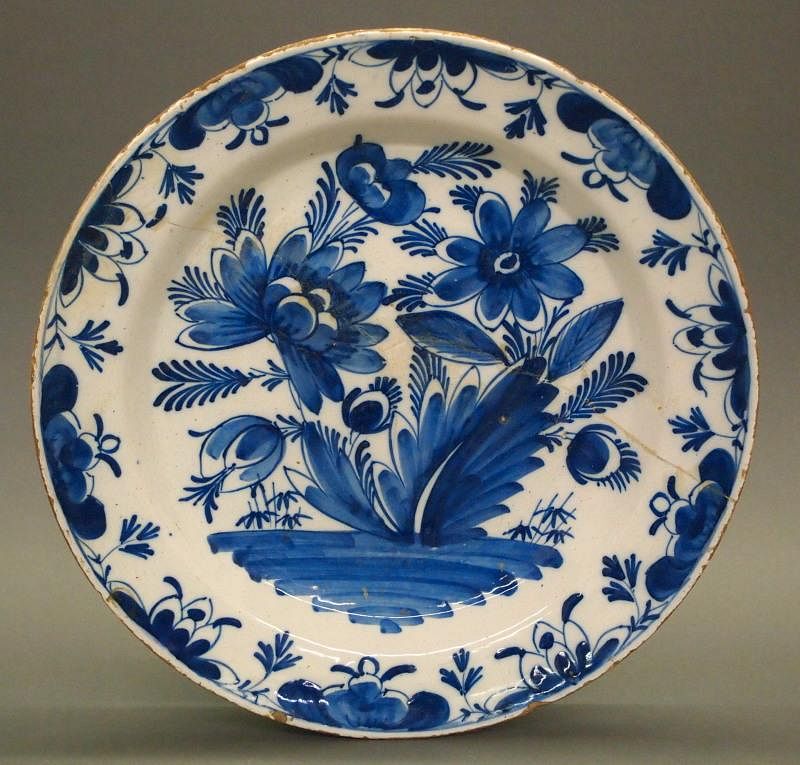 Appraisal: Dutch Delft chargers Two th century Dutch Delft ware chargers