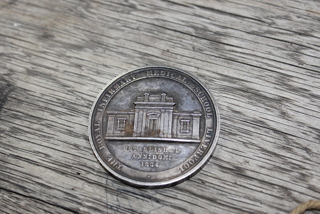 Appraisal: A SILVER SURGERY MEDAL from The Royal Infirmary Medical School