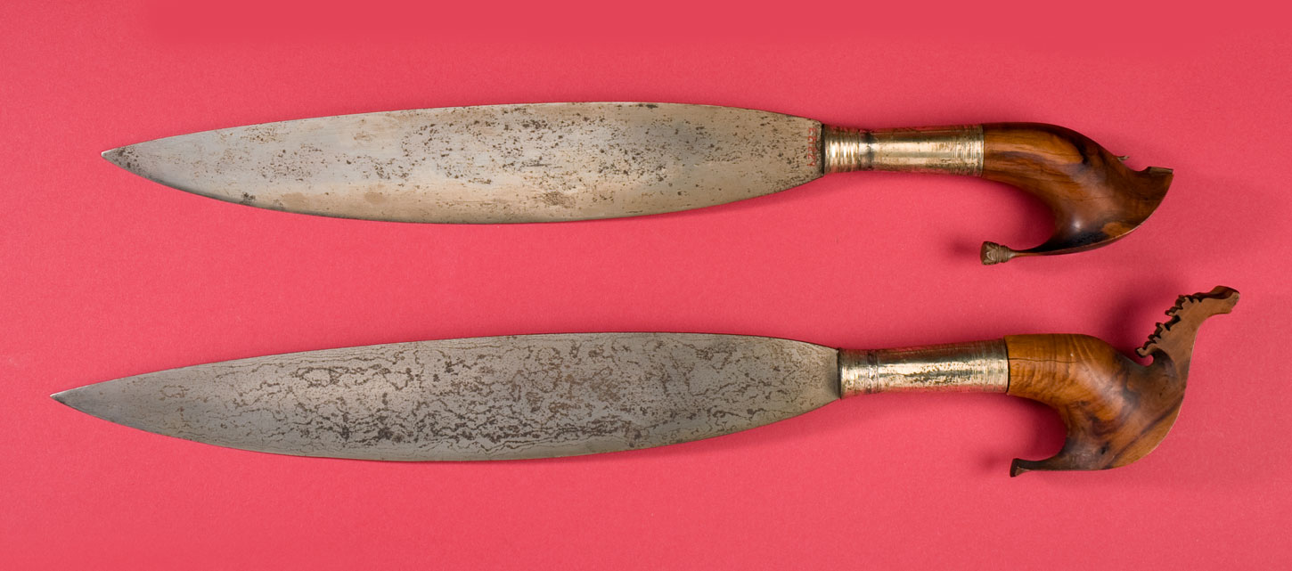 Appraisal: TWO LATE NINETEENTH CENTURY MORO BARONGS Each with carved burl