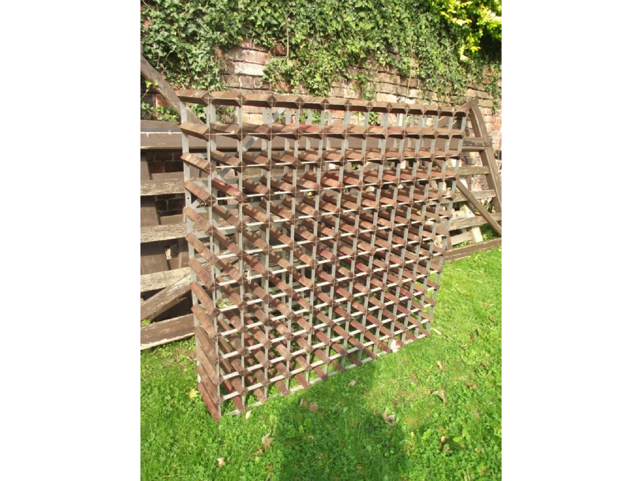 Appraisal: A wine rack for a gross of bottles