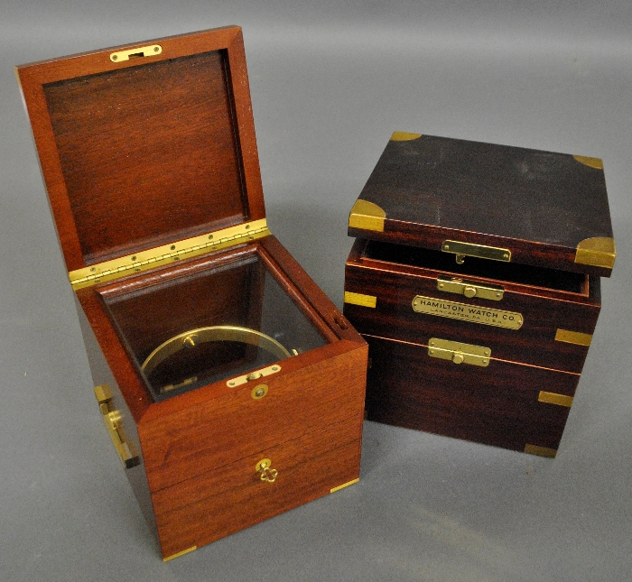 Appraisal: - Two contemporary mahogany chronometer boxes one signed Hamilton Watch