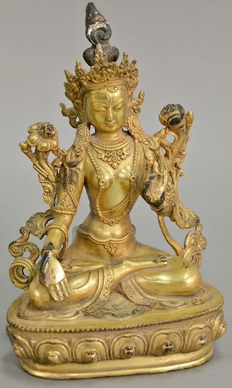 Appraisal: Gilt bronze guanyin seated figure on lotus form base ht