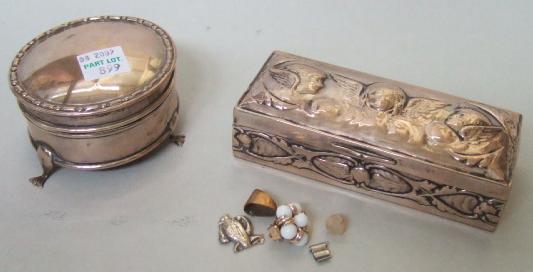 Appraisal: A silver rectangular hinge lidded trinket box decorated with winged