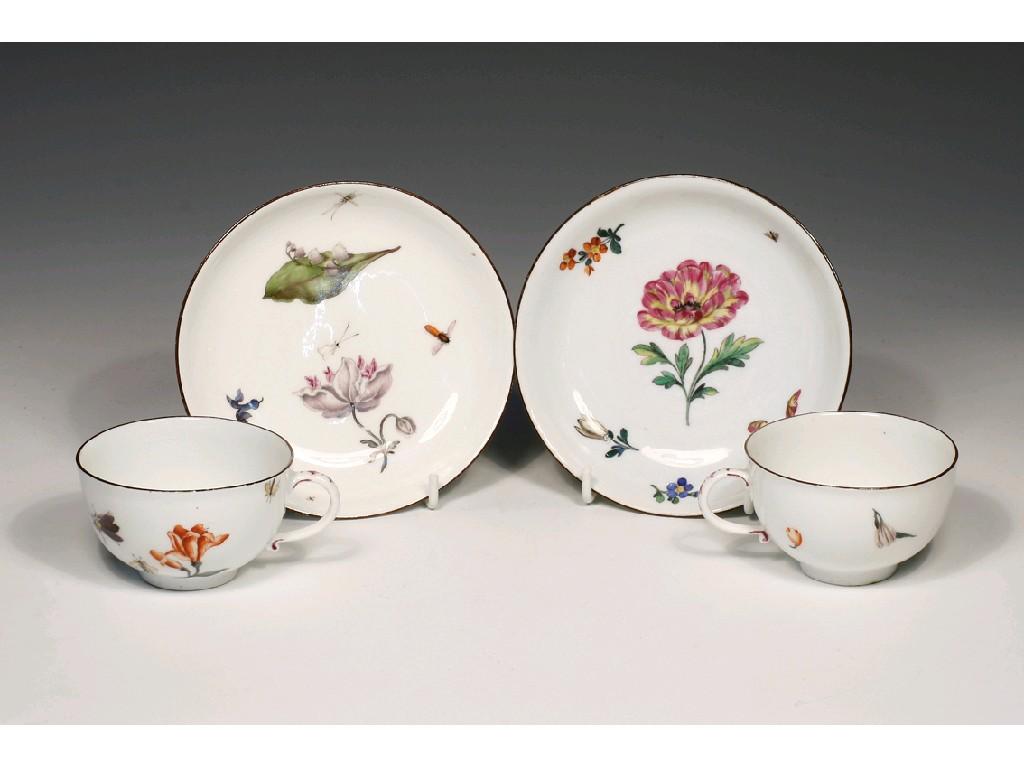 Appraisal: A PAIR OF MEISSEN TEA CUPS AND SAUCERS each painted