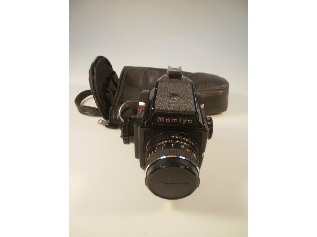 Appraisal: A Mamiya M camera with Sekor C lens case and