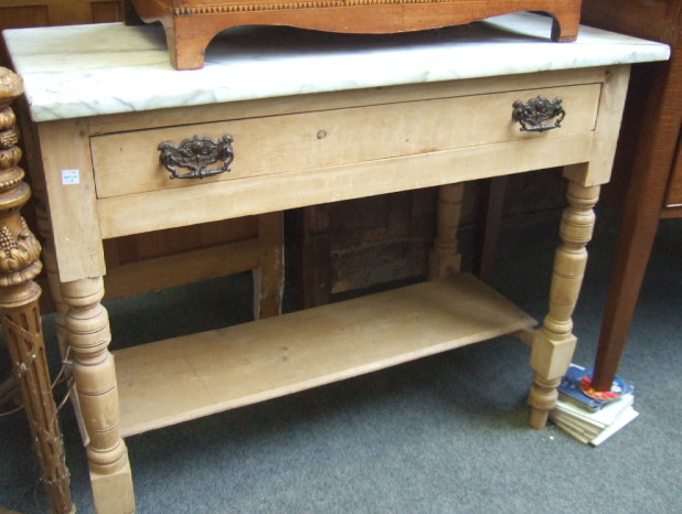 Appraisal: A th century pine wash stand the white marble top