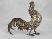 Appraisal: A white metal tests silver cockerel two unascribed assay marks