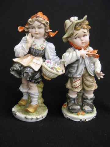 Appraisal: Pair of Porcelain Figurines cherubs on horseback and girl with