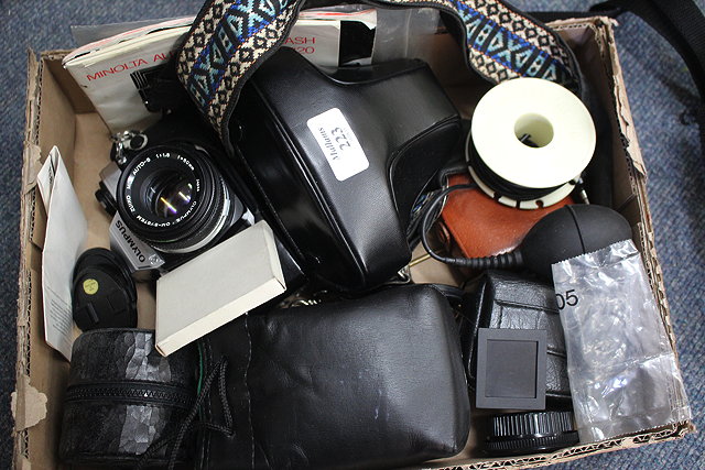 Appraisal: AN OLYMPUS OM MM CAMERA fitted with an Olympus OM-system