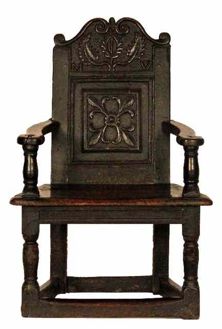 Appraisal: A child's th Century oak chair the cresting rail carved