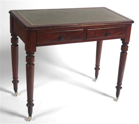 Appraisal: A late Victorian mahogany writing table the moulded rounded rectangular