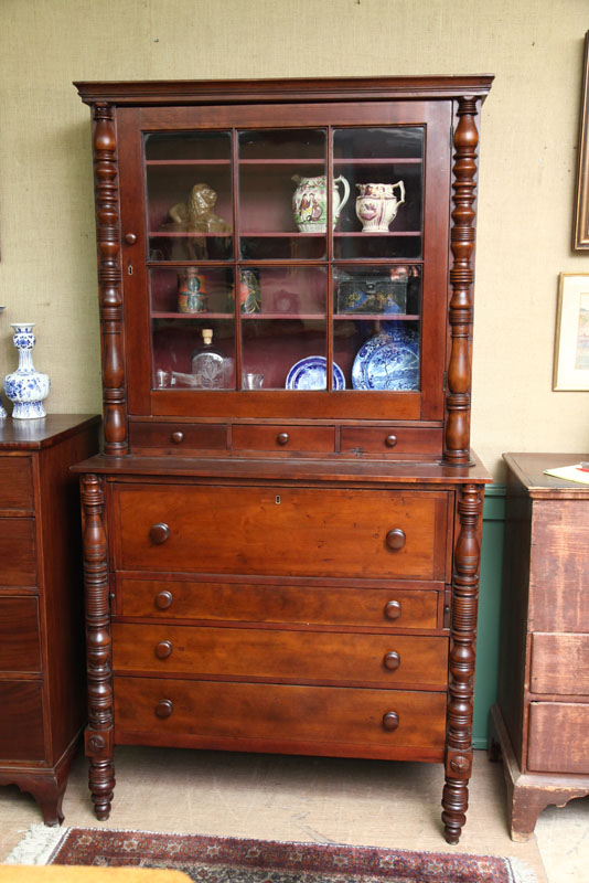 Appraisal: TWO PIECE BUTLER'S CHEST BOOKCASE Mixed woods having a molded