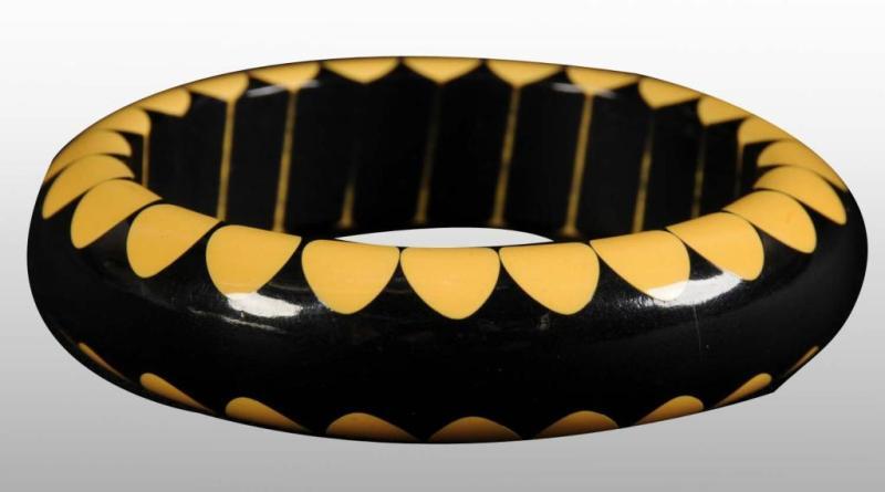 Appraisal: Bakelite Black Cream Bow Tie Bracelet Condition Near Mint Size