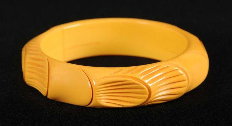 Appraisal: Bakelite Carved Geometric Bamboo-Like Bracelet Condition Excellent Size - Dia