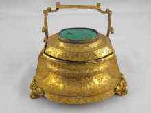 Appraisal: An ormolu inkwell with inset malachite to lid probably French