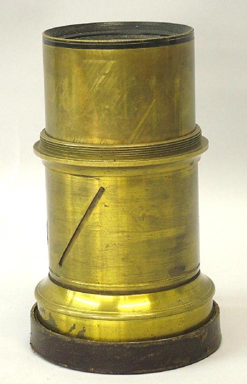 Appraisal: Brass bound lens and cover with helical focusing and iris