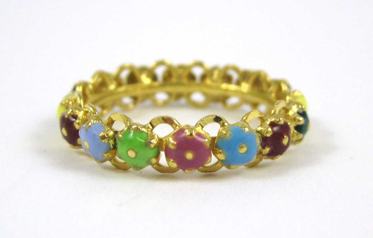 Appraisal: MULTI COLOR ENAMEL AND YELLOW GOLD RING The k gold