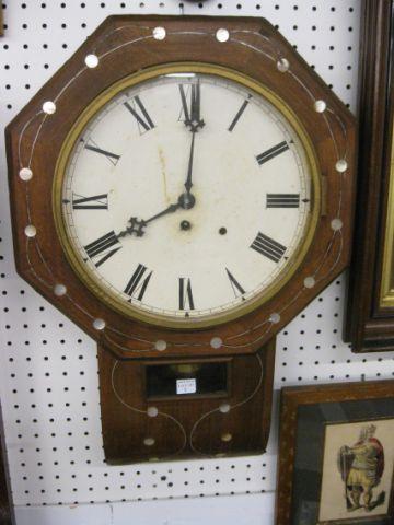 Appraisal: Antique Wooden Wall Clock octagon top mother-of-pearl inlay