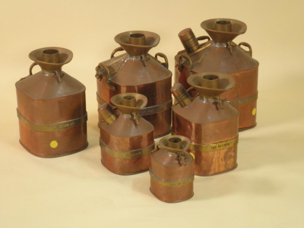 Appraisal: A set of six brass and copper petrol measures each