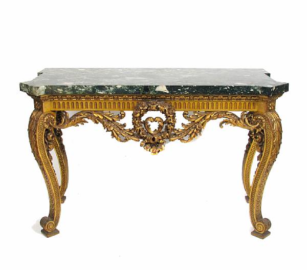 Appraisal: A Regence style giltwood console table with marble top height