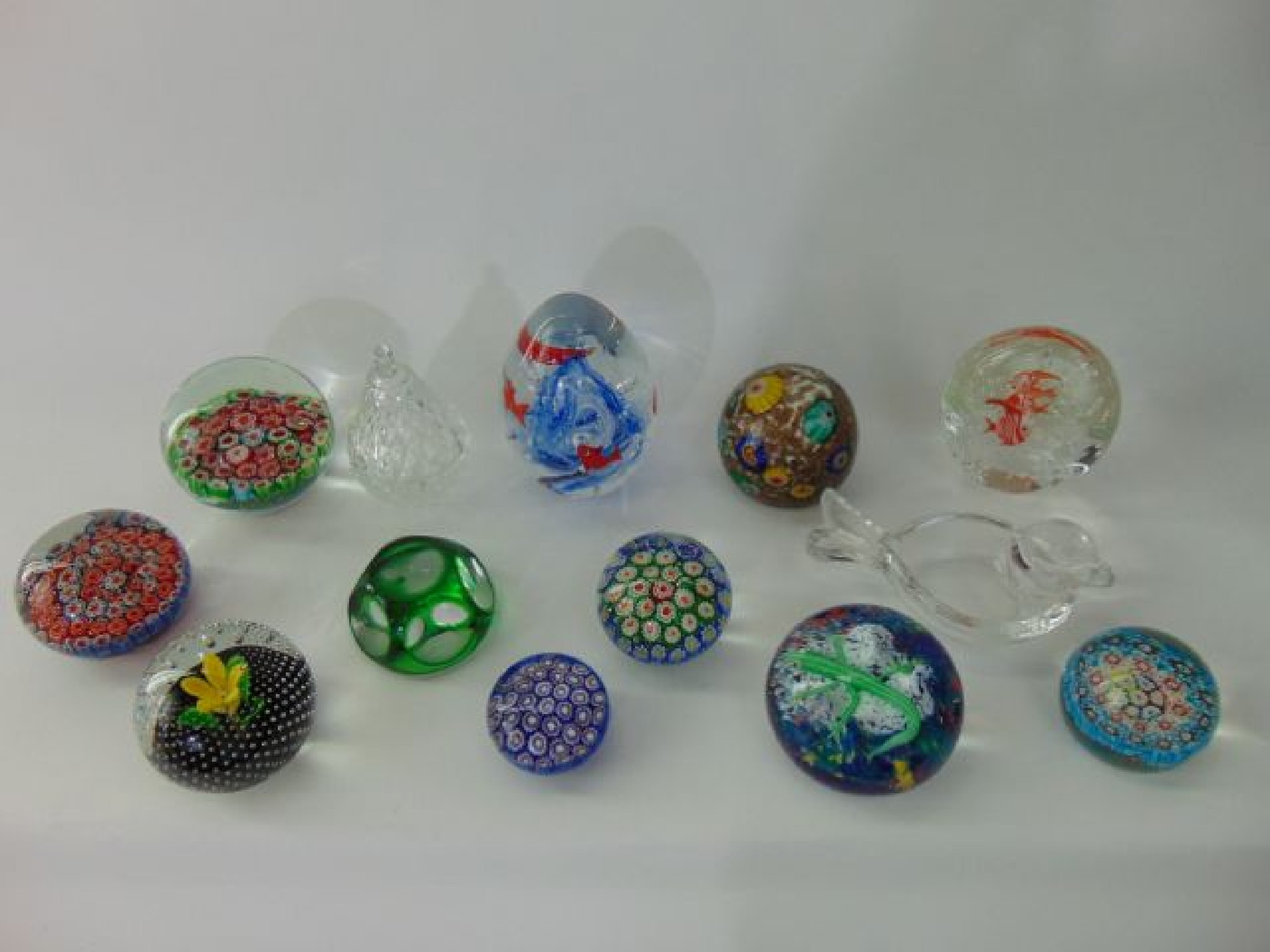 Appraisal: A selection of eleven various glass paperweights to include numerous