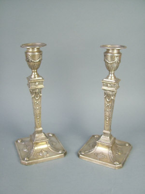 Appraisal: A pair of Scottish silver candlesticks edinburgh c Each of