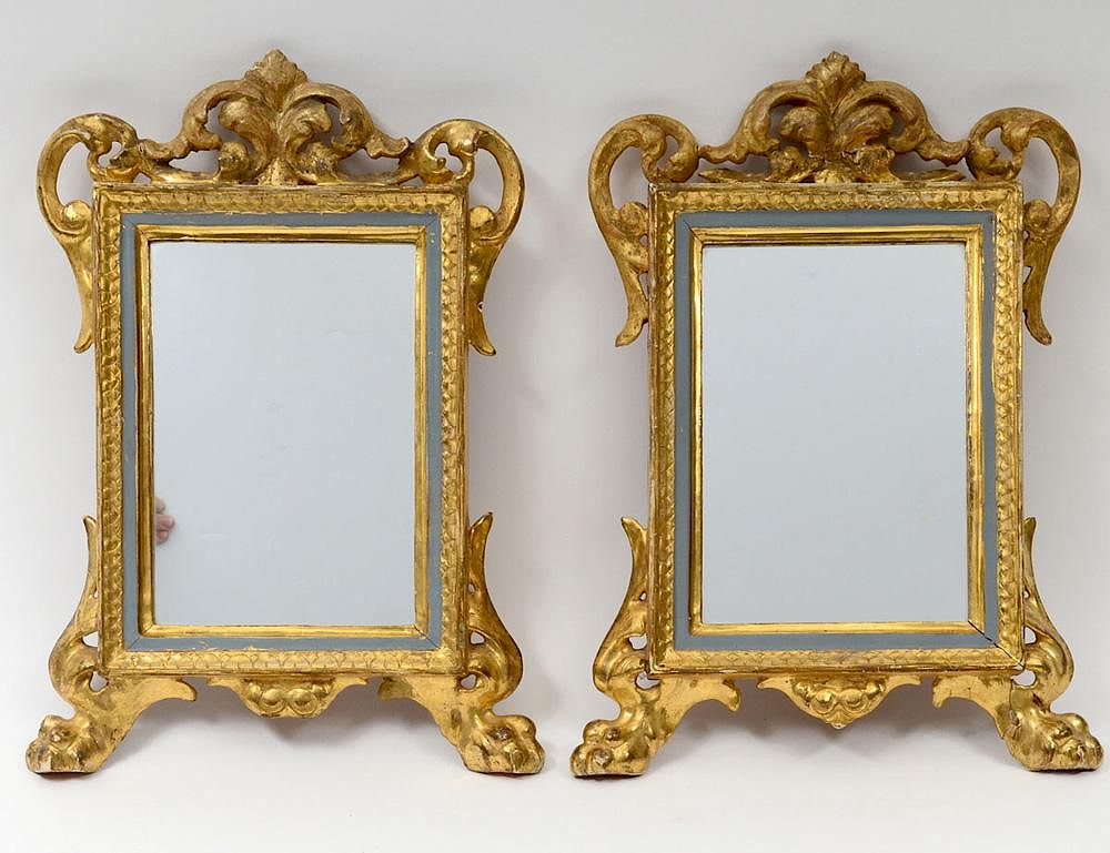 Appraisal: PAIR OF CARVED AND GILTWOOD SMALL MIRRORS Italian th Century