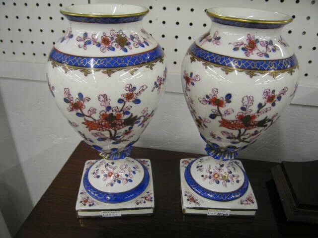 Appraisal: Pair of Handpainted Porcelain Vases pedestal bases rich florals