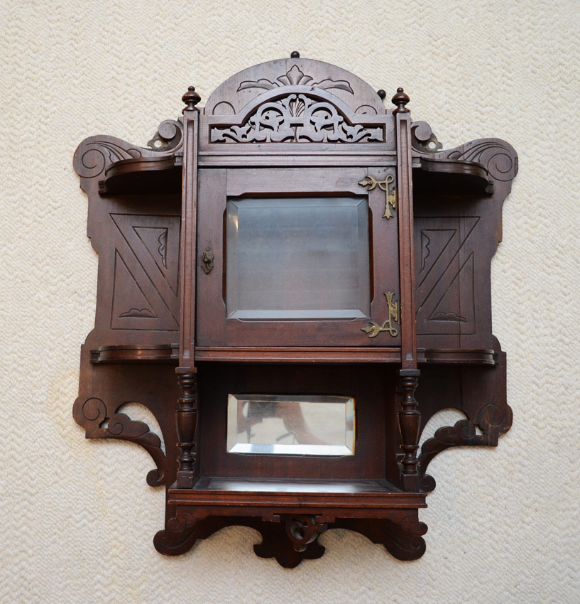 Appraisal: VICTORIAN WALL HANGING CUPBOARD Carved back and side panels pierced