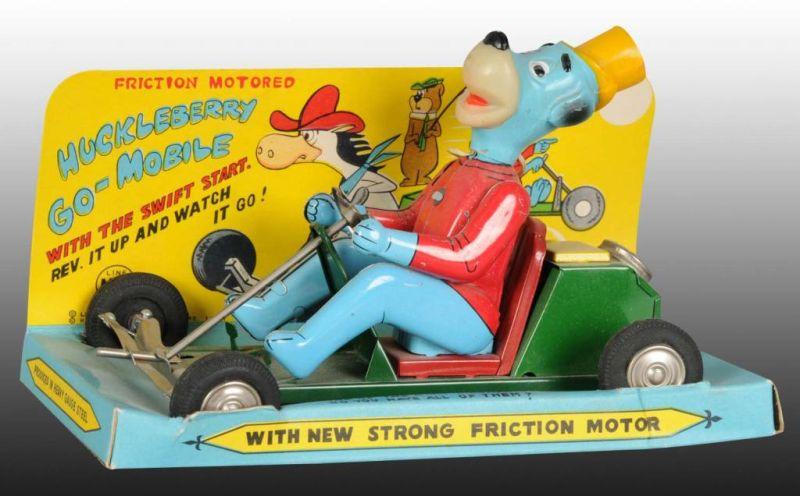 Appraisal: Linemar Huckleberry Hound Go-Mobile Toy Description Japanese Toy is on