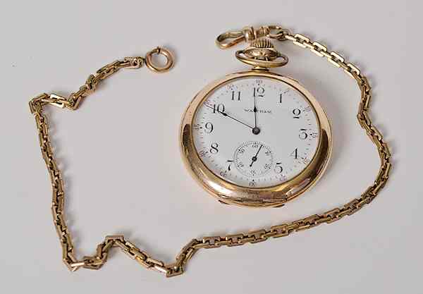 Appraisal: Waltham Pocket Watch American a Waltham pocket watch with fob