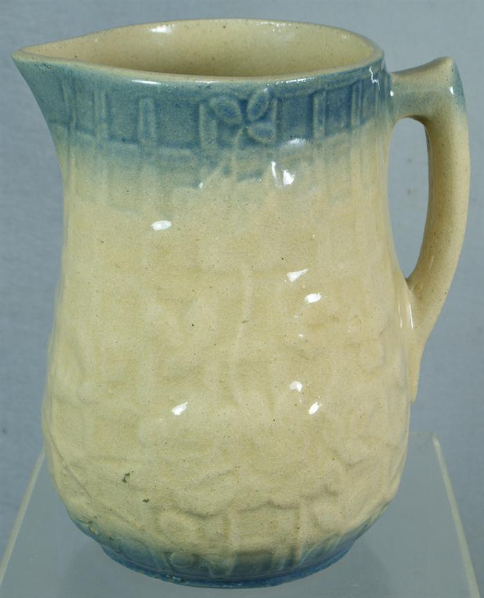 Appraisal: Yellowware pitcher with light blue rim decoration square trellis and