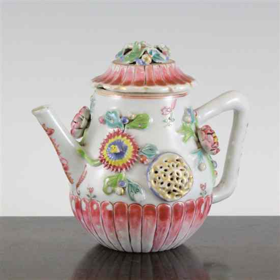 Appraisal: A Chinese famille rose pear shaped teapot and cover Yongzheng