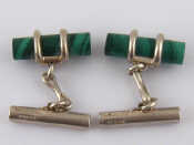 Appraisal: A pair of white metal tests silver and malachite cufflinks