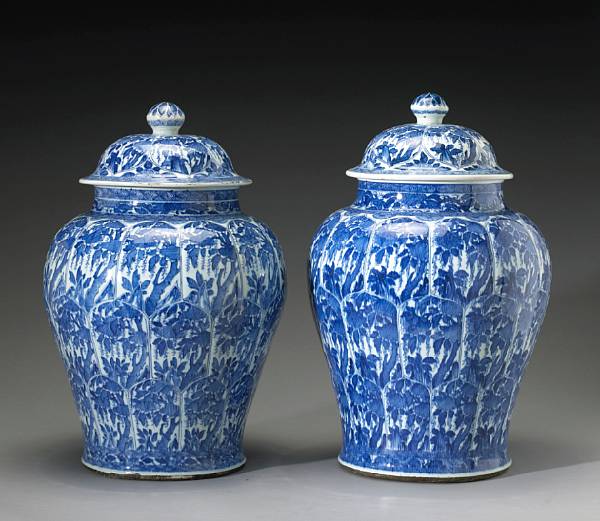 Appraisal: A pair of large blue and white baluster covered jars