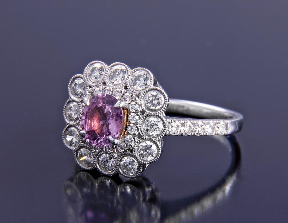 Appraisal: Platinum Pink Sapphire and Diamond Ring prong-set oval mixed cut